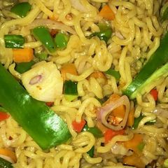 Stir fried noodles with veggies and garlic A picture of Stir fried noodles with veggies and garlic.