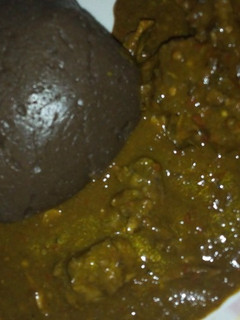 A picture of Amala with dry okro soup.