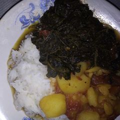 A picture of Rice with kienyeji and viazi#weeklyjikonichallenge.