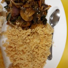 A picture of Butter Couscous with Chilli Garlic Mushrooms.