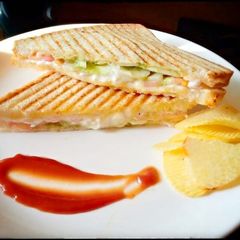 A picture of Grilled veg cheese sandwich.