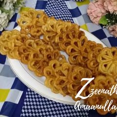 A picture of Achappam or Kerala Rose Cookies.