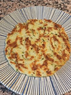 Una foto de Arepas de calabacín y queso
