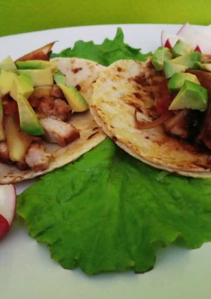 Una foto de Tacos de lomo flameado a la naranja