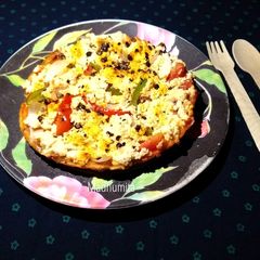 Oats Pizza Crust with toppings A picture of Oats Pizza Crust with toppings.