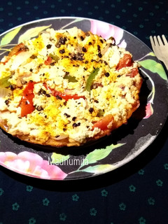 A picture of Oats Pizza Crust with toppings.