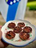 Galletitas de chocolate (sin harina) con pasas, naranja confitada casera y almendras laminadas