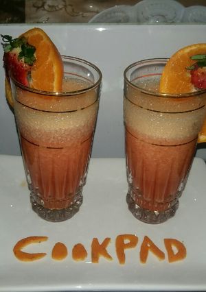 A picture of Orange strawberry smoothy.