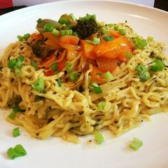 A picture of Mexican stir fry with Noodles.