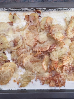 Una foto de Patatas con crema de leche y queso emental