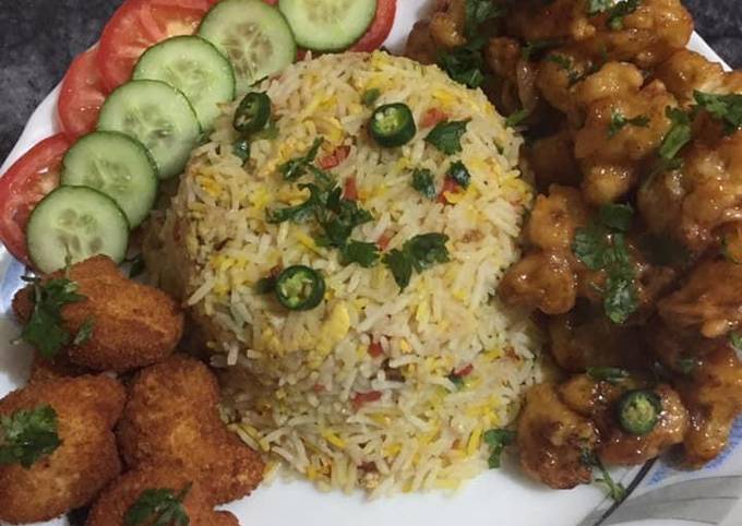 Gobi manchurian with vegetables rice and chicken nuggets