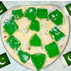 A picture of Vanilla custard with green jelly.