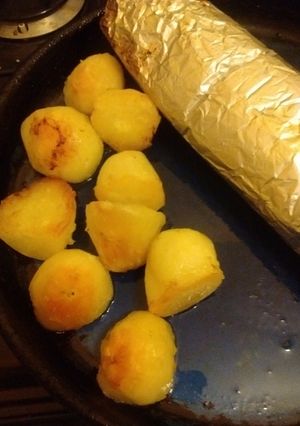 Una foto de Paquete de corvina y vegetales