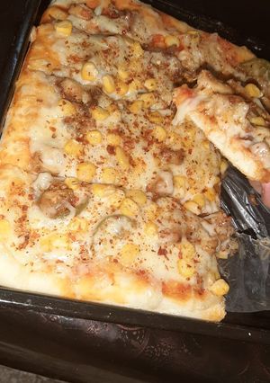 A picture of Square pizza 🍕🍕🍕🍕.