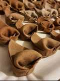 Tortelloni alla massa di cacao, ricotta e noci