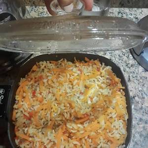 Arroz integral sin sal, con vegetales al dente (zanahoria, cebolla y pimentón)