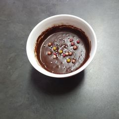 A picture of Dairy free chocolate Pudding in a Mug.