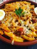 Macarrones gratinados con salsa boloñesa y orégano (cocina de aprovechamiento total)