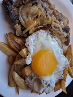 Una foto de Bife de cuadrada a lo pobre