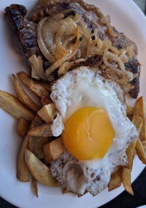Una foto de Bife de cuadrada a lo pobre