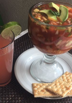 A picture of Michoacán-Style Shrimp Cocktail and Non-Alcoholic Citrus Drink.
