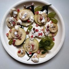 A picture of Summer fruit salad with yogurt.