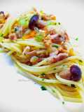 Spaghetti con ragù di coniglio, funghi e noci