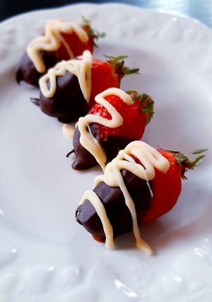 Une photo de Fraises enrobées de chocolat