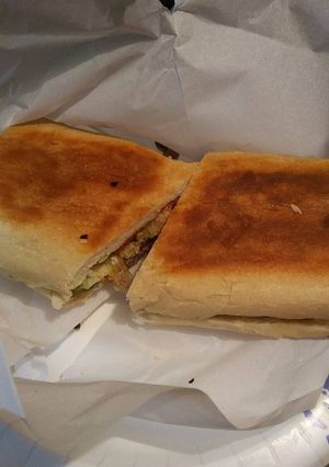 A picture of Cuban Bread Meat lovers Sandwich.