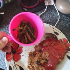 A picture of Twice baked meatloaf and microwave Asparagus.