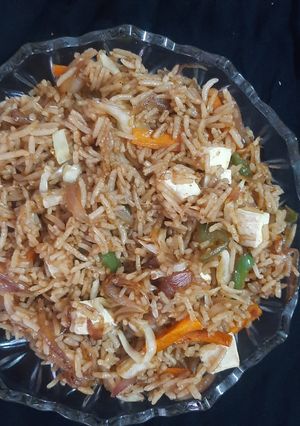 A picture of Leftover fried rice.