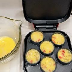 A picture of Egg Bites with Cottage Cheese, Onion, and Bell Pepper.