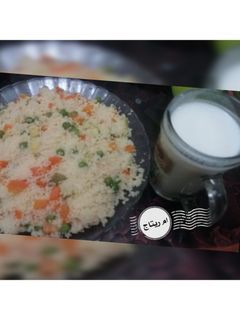 صورة لوصفة كسكس بالخضار 🥕🥒 واللبن 🥛
