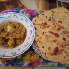 A picture of Crispy paratha with loky chicken.