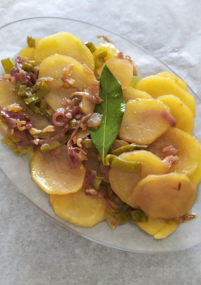 Una foto de Patatas panaderas con pimientos verdes