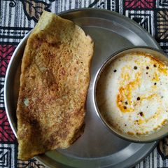 A picture of Dal Chilla with Coconut Chutney.