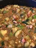 Lentilles brunes au lard, courgettes, pancetta et épices