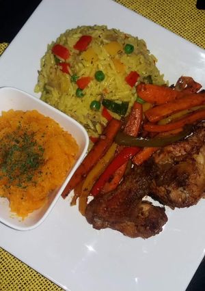 A picture of Fried Rice, Chicken with butternut sauce.