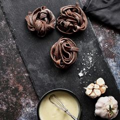 A picture of Cocoa Pasta with Cheese Sauce.