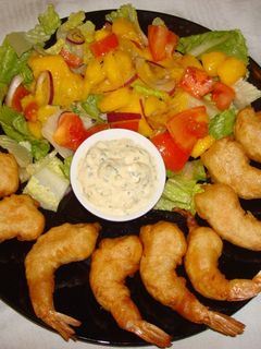 A picture of Beer batter shrimps and mango salad.