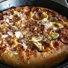A picture of Bbq pepperoni deep dish pizza in a Cast Iron skillet.