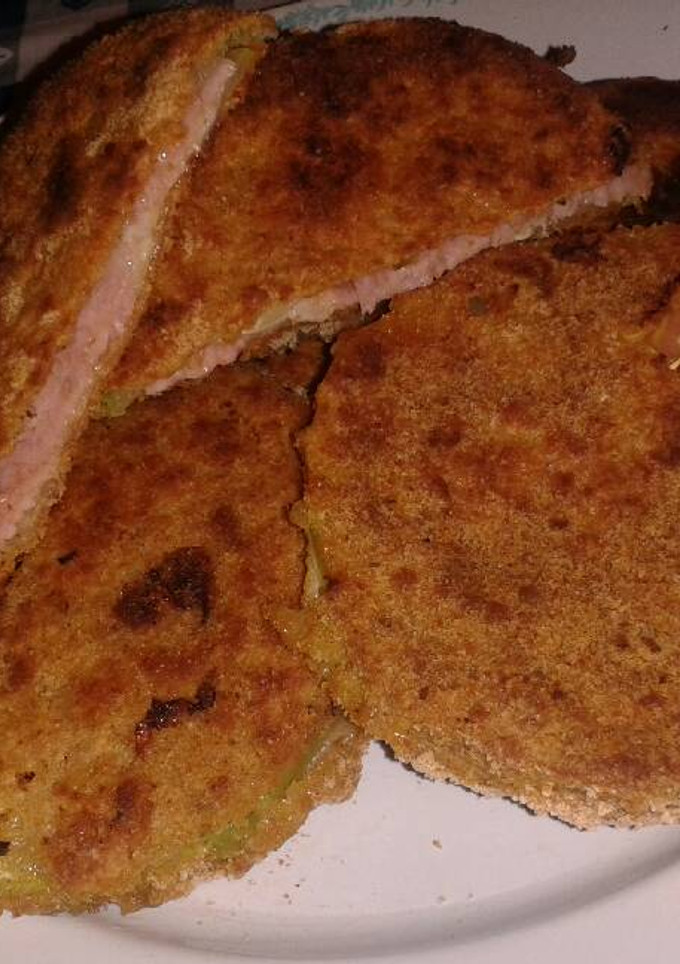 Una foto de Milanesas de zucchini rellenas