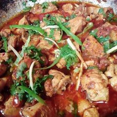 A picture of Achari chicken karahi.