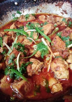 A picture of Achari chicken karahi.