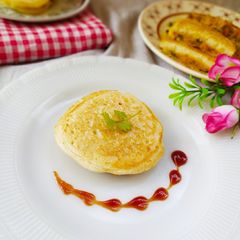 A picture of Veg stuffed Suji Pancake.