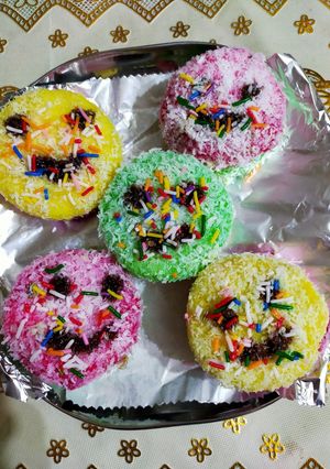 A picture of Tasty Colourfull coconut dryfruit emojis.