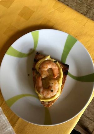 Foto di Crostino code di gambero su letto di salsa al curry