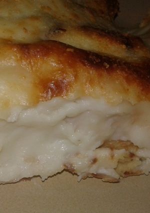 Una foto de Canelones de jamón y queso muzzarella