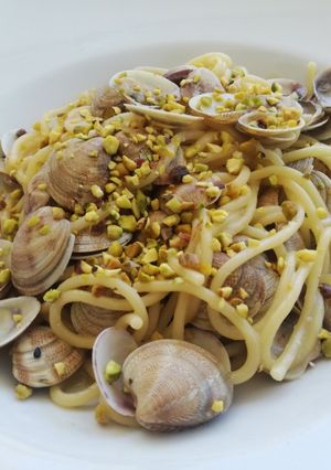 A picture of Spaghetti with Fresh Clams and Bronte Pistachio Crumble.