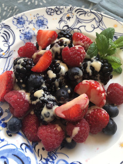 A picture of Berries with tahini sauce.